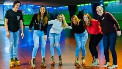 Adults skating at an Adult skate party at Wigwam Skate and Event Center